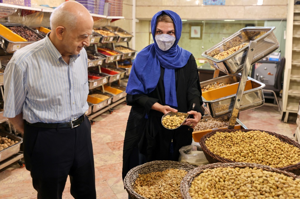 Iranian pistachio wholesaler Abbas Emami and his daughter Marjan