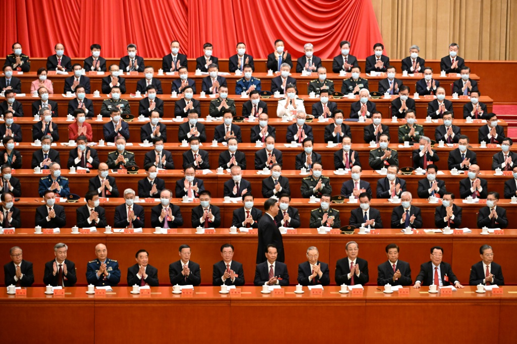 In line with strict health protocols, all those attending the Communist Party Congress were masked, apart from the front row of top-ranked guests