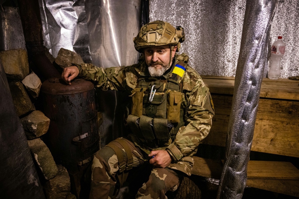 A Ukrainian serviceman displays a sauna, build in a trench on the front line in eastern Ukraine's Donetsk region
