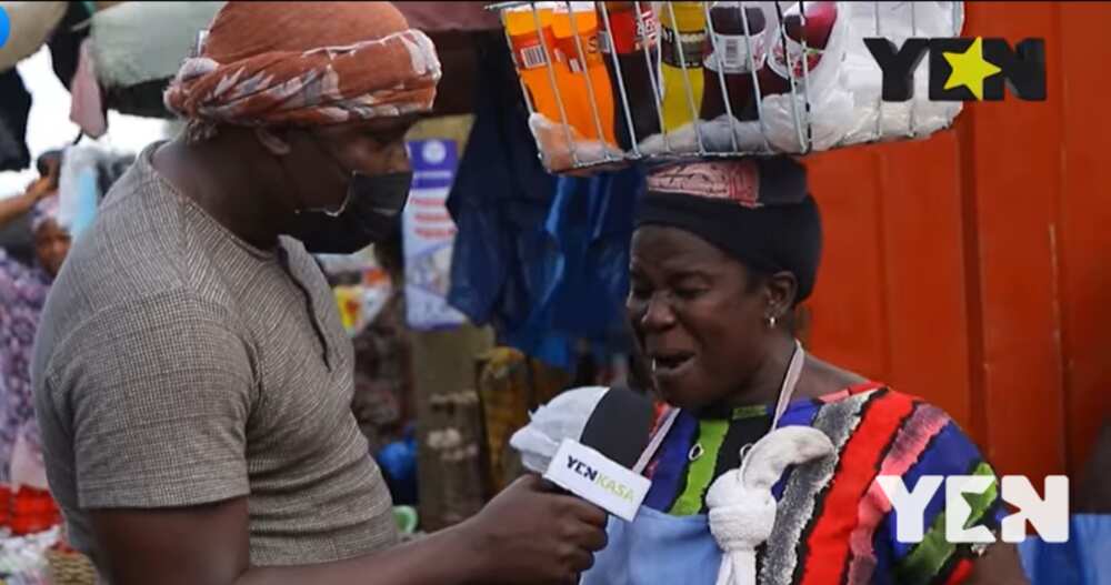 Ghanaian man woman speaking in an interview