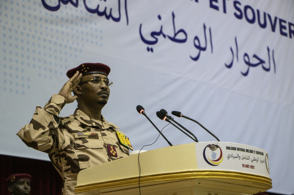 Chad's junta leader Mahamat Idriss Deby Itno salutes during the opening ceremony of the national dialogue