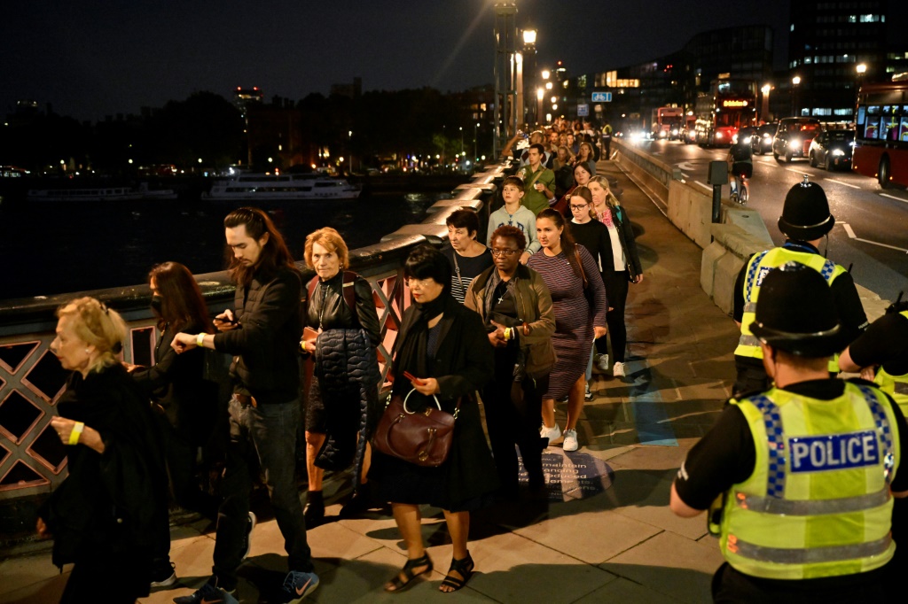 The queue snaked back for nearly three miles (five kilometres) along the Thames riverbank on Wednesday