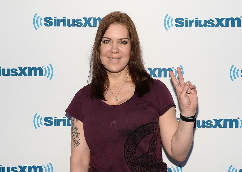 Chyna does the peace sign during her visit to SiriusXM Studios in New York City