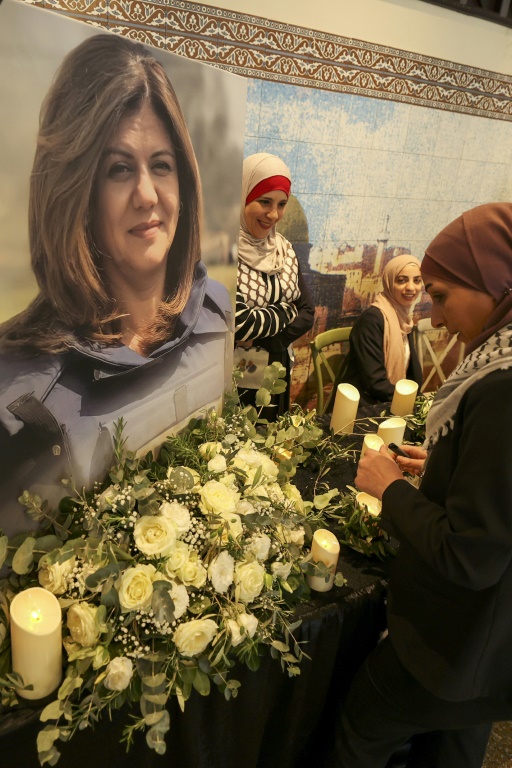 Mourners at a memorial ceremony for Al Jazeera journalist Shireen Abu Akleh, at a service in the West Bank city of Ramallah on June 19, 2022