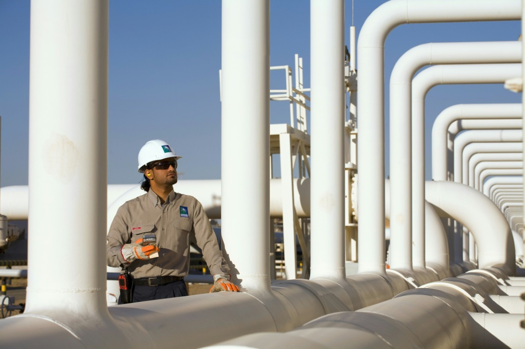 A handout picture provided by Energy giant Saudi Aramco, Saudi Arabia's Oil Company, shows one of its engineers at Yanbu refinery on January 16, 2011
