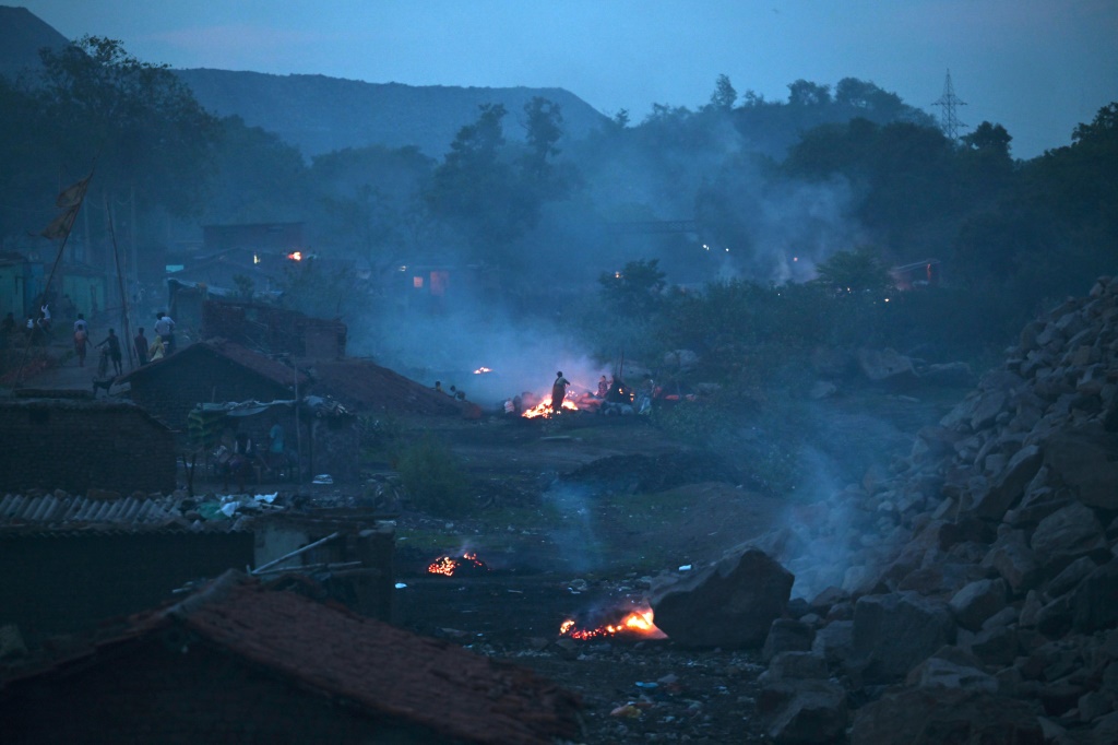 Underground fires in opencast coal mines in eastern India have raged for over a century, creating sinkholes that swallow people and homes