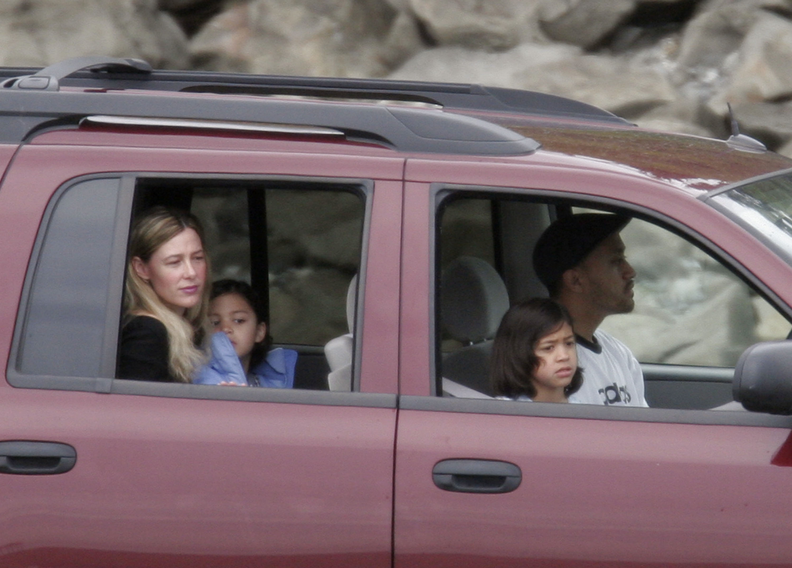Mary Letourneau, her fiance Vili Fualaau, and their two children drive along the beach