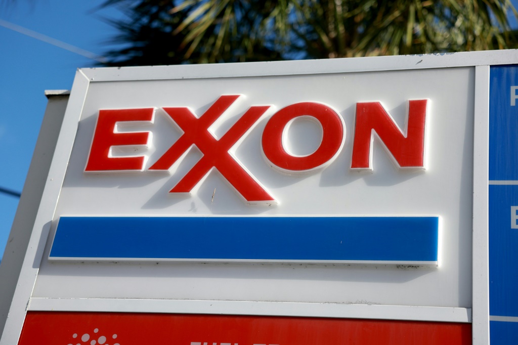 Shares of ExxonMobil retreated following reports it is nearing a potential deal to acquire Pioneer Natural Resources that could be worth $60 billion