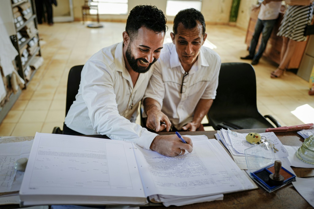 Lazaro Gonzalez (R) and Adiel Gonzalez were among the first to legally tie the knot in Cuba