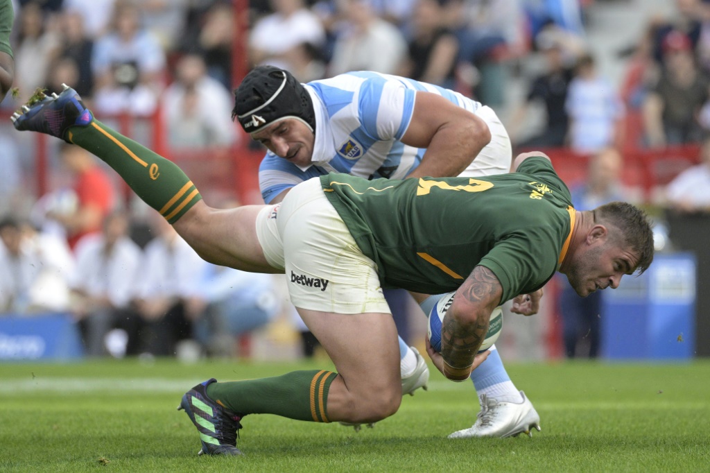 South Africa hooker Malcolm Marx (front) is tackled by Argentina lock Tomas Lavanini during a Rugby Championship match in  Buenos Aires on September 17, 2022.