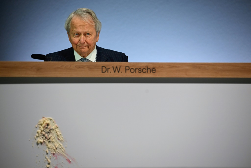 Cake was thrown at Wolfgang Porsche, board member of German car giant Volkswagen, at a shareholder meeting