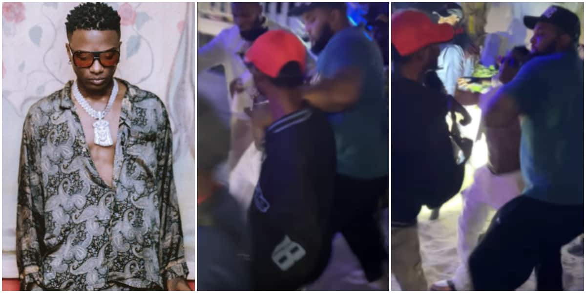Wizkid gives man dirty slap for trying to 'grab' his diamond necklace, he screams in pain, video trends online
