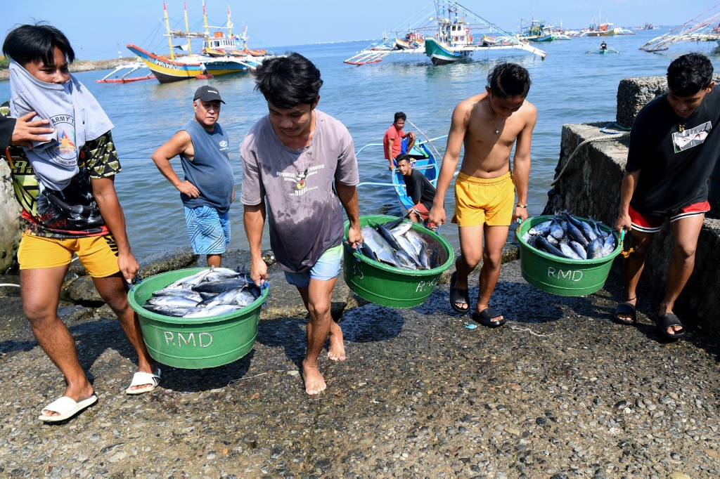 Beijing's seizure of Scarborough Shoal in the South China Sea has robbed fishermen Filipino fishermen in Cato village of a key source of income