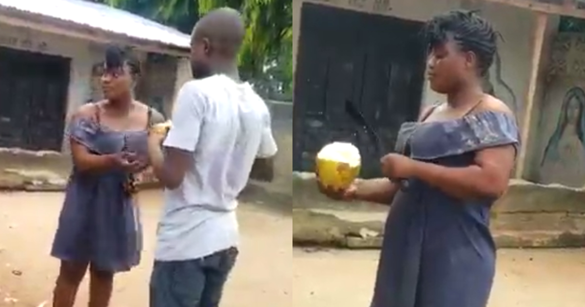 Ghanaian lady sells coconut to a male client