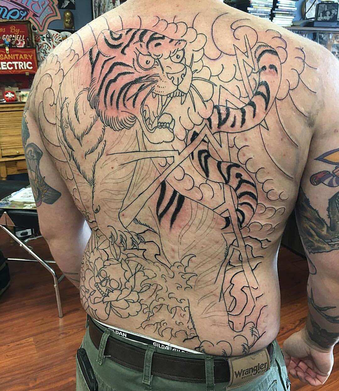 15 Japanese tiger tattoo designs and ideas that will convince you to get  inked - YEN.COM.GH