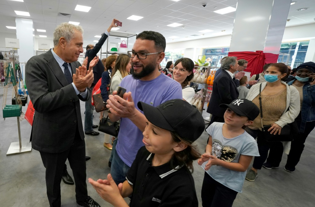 Century 21 co-CEO Raymond Gindi welcomes customers back for the re-opening of its flagship department store in Manhattan after three years of closure due to Covid