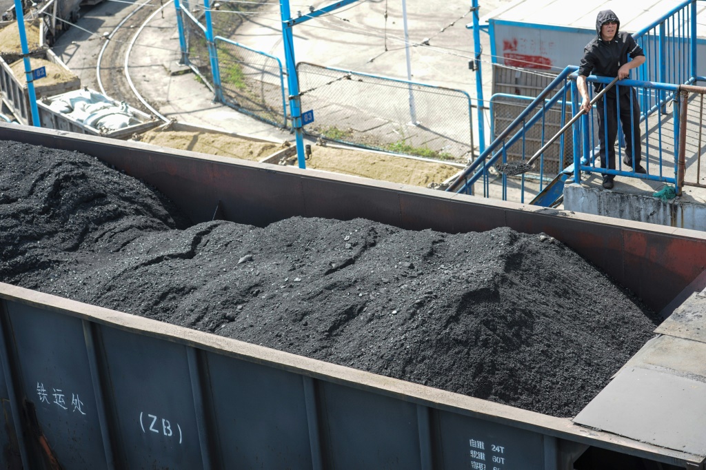 Coal loaded on trains at a coal plant in Huaibei, in China's eastern Anhui province, on June 23, 2022 -- coal power still makes up most of China's energy supply