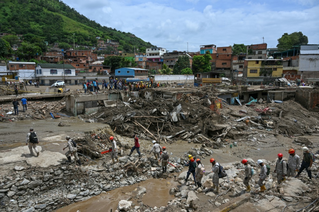 The death toll has risen to 50 from a devastating landslide that swept through Las Tejerias, Venezuela