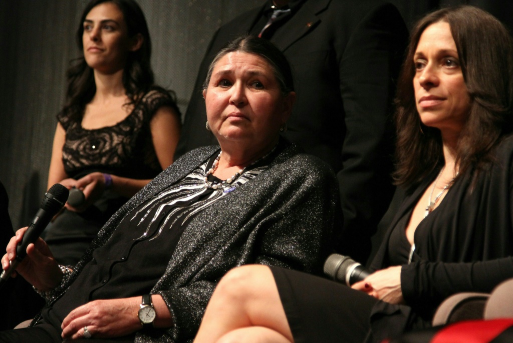 Sacheen Littlefeather (L), who is Apache and Yauqui, was heckled at the 1973 Academy Awards while explaining why an absent Brando could not accept his best actor Oscar
