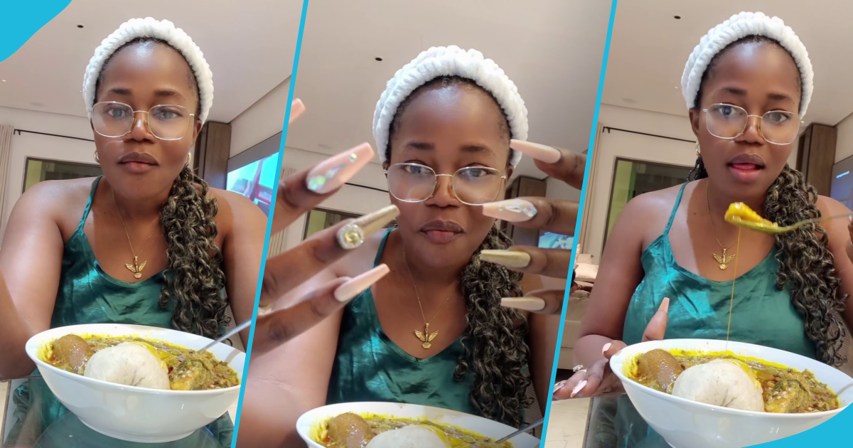 Mzbel in pics eating banku and okro with a spoon