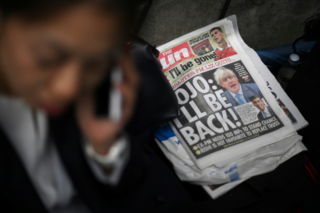 A copy of The Sun newspaper featuring former prime minister Boris Johnson lies on the floor outside 10 Downing Street
