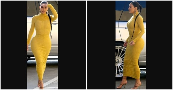 Kim Kardashian stuns in yellow dress as she displays curves