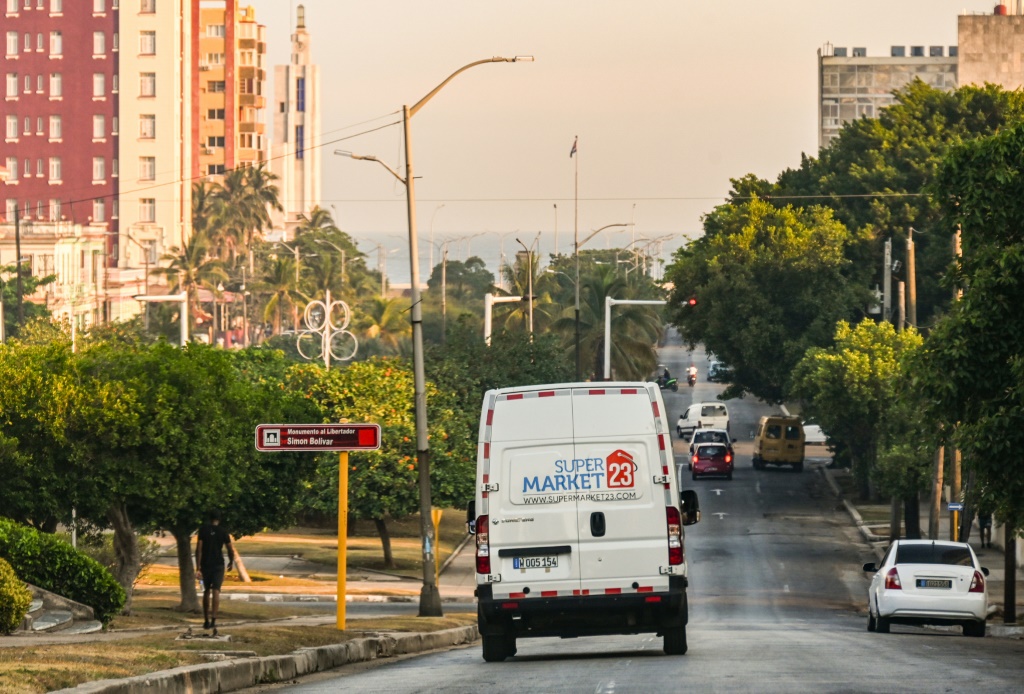 A delivery van from a US-based food remittance company drives on a street in Havana on May 22, 2024
