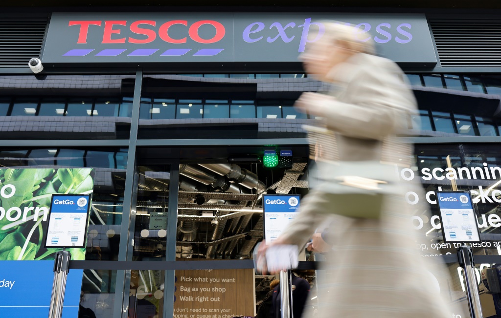 Tesco said it will cut 1,750 management roles and another 350 in other restructuring