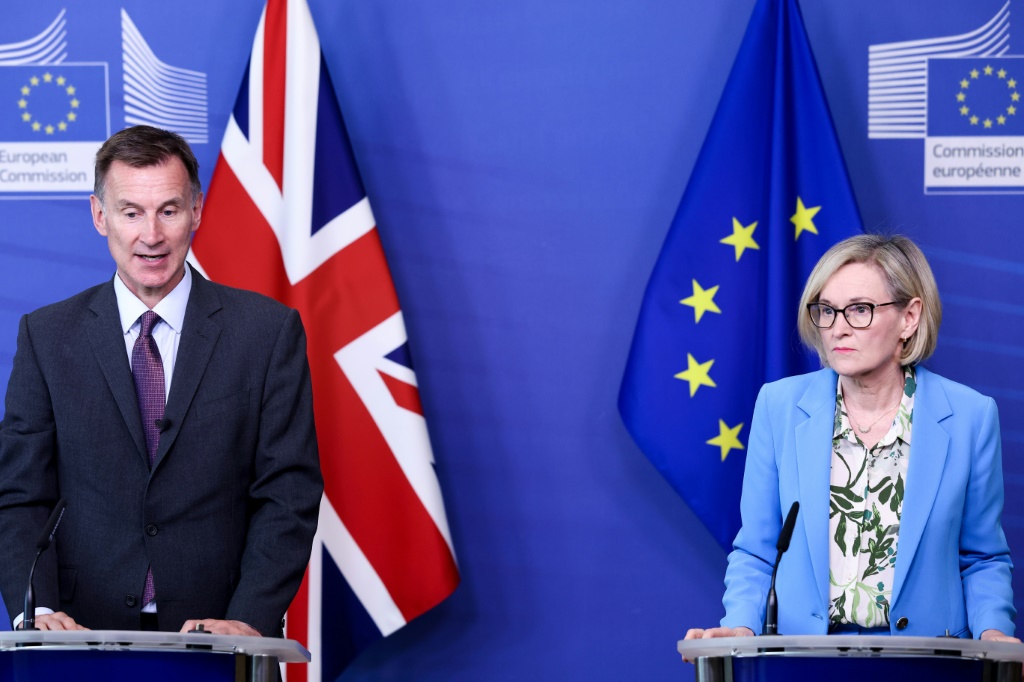 Britain's finance minister Jeremy Hunt and EU commissioner Mairead McGuinness signed an EU-UK financial services agreement