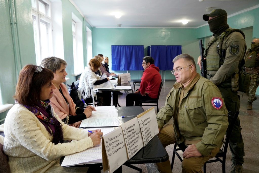 The Moscow-appointed mayor of Mariupol in southern Ukraine visits a polling station in a ballot dismissed by the West and Kyiv as a 'sham'