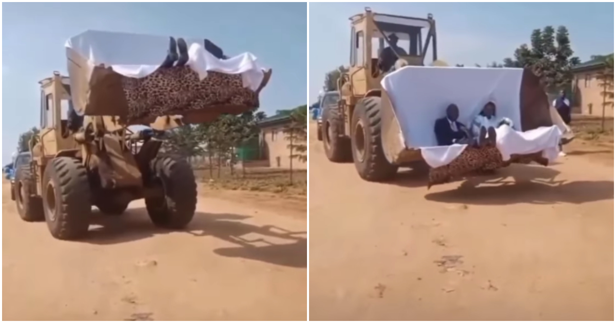 Bride and groom use caterpillar machine for their wedding.