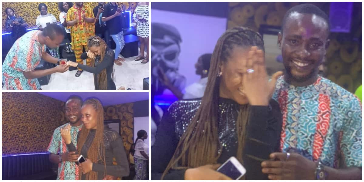 Cute photos as Nigerian lady goes on knees in public to accept man's proposal, says he is the man of the house