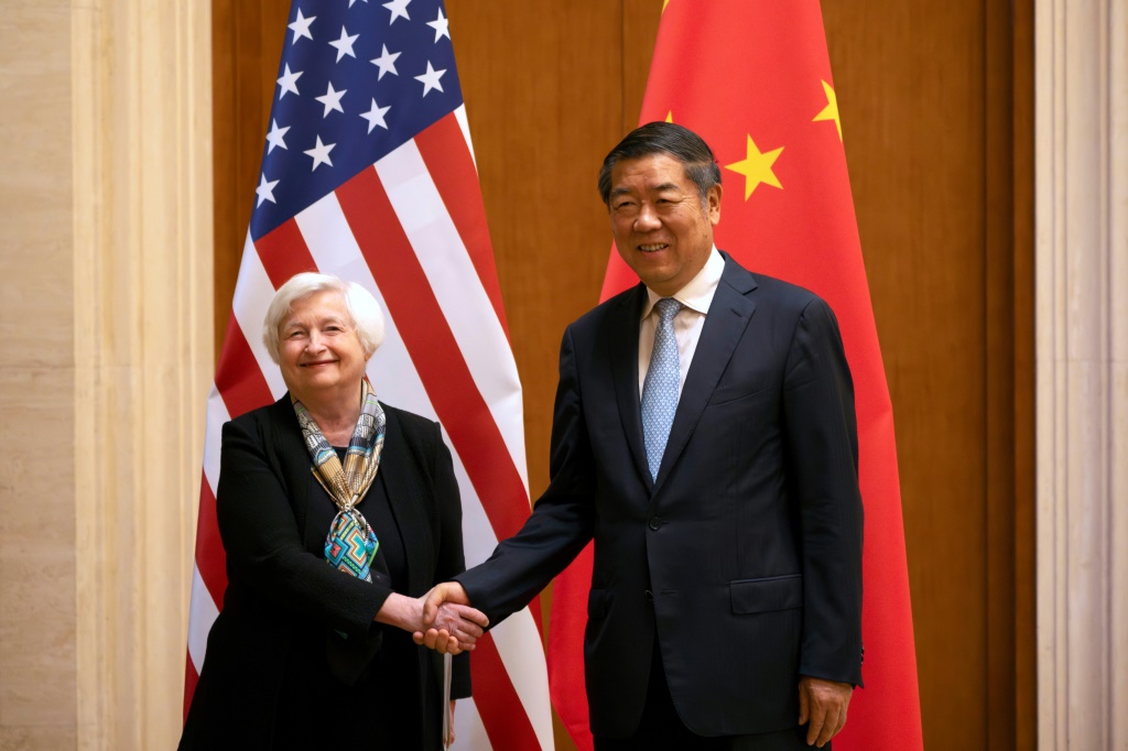 US Treasury Secretary Janet Yellen (L) shakes hands with Chinese Vice Premier He Lifeng during a a visit to Beijing