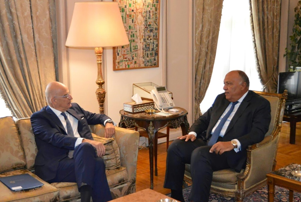 Egyptian Foreign Minister Sameh Shoukry (R) met with his Greek counterpart Nikos Dendias in Cairo on Sunday, discussing events in neighbouring Libya