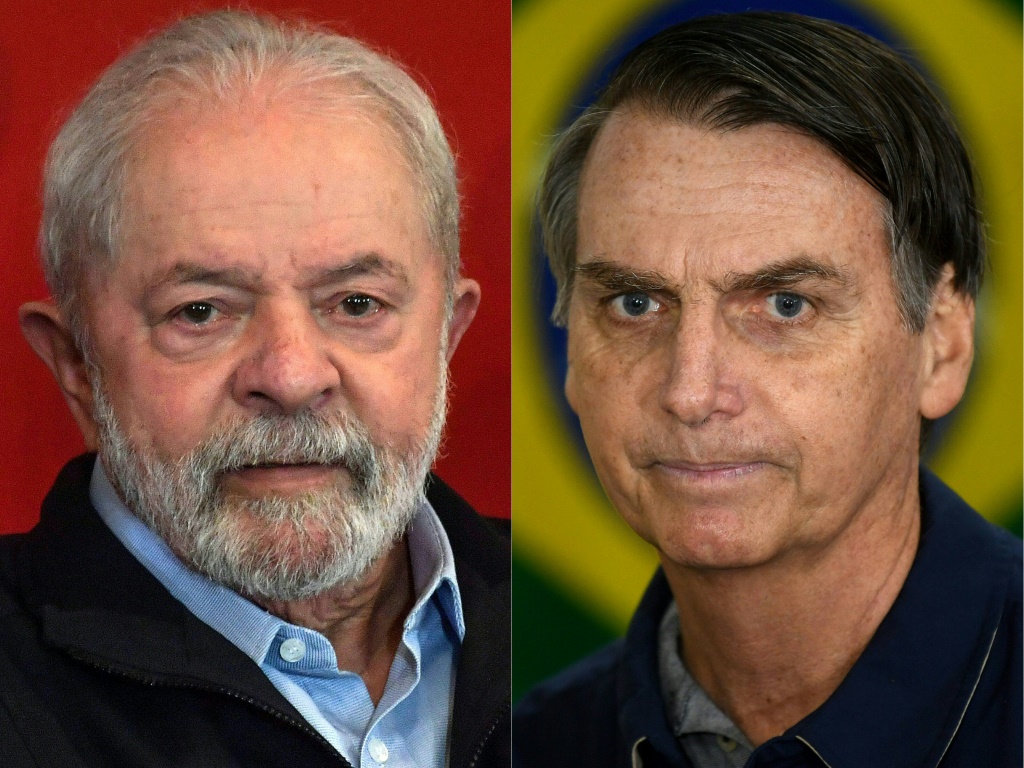 Brazilian President Jair Bolsonaro (R) trails Luiz Inacio Lula da Silva (L) by a score of 47 percent to 53 percent, according to the most recent Datafolha institute poll