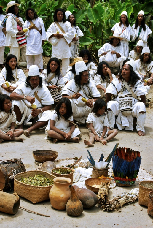 Members of the Arhuaco indigenous community carry out a ritual to honor nature and ask for forgiveness the damage caused by white people