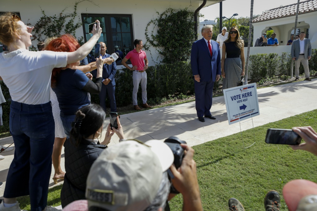 Former US president Donald Trump and wife Melania Trump addressed reporters after voting in Palm Beach, Florida