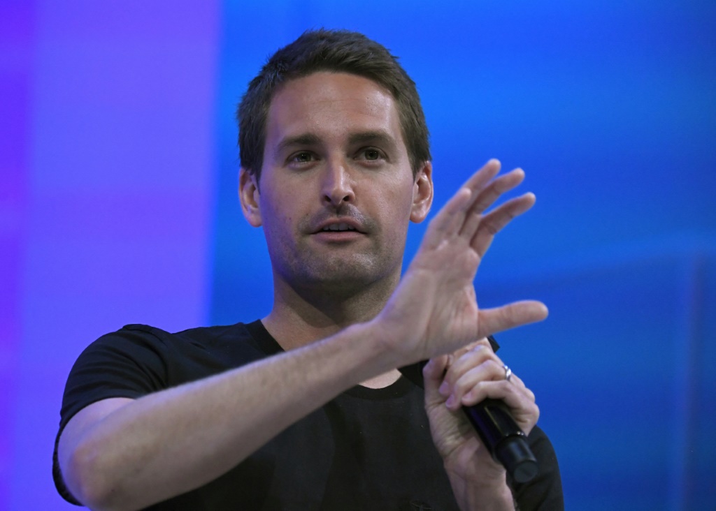Snapchat founder and CEO Evan Spiegel, seen in June 2022, informed employees of layoffs due to 'the consequences of our lower revenue growth'