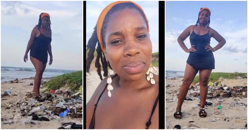 US lady at dirty Accra beach