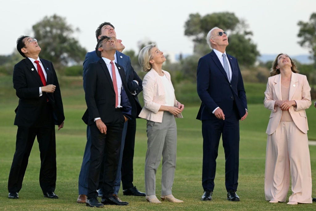 G7 leaders attend a skydiving demonstration at the San Domenico Golf Course in Savelletri, Italy