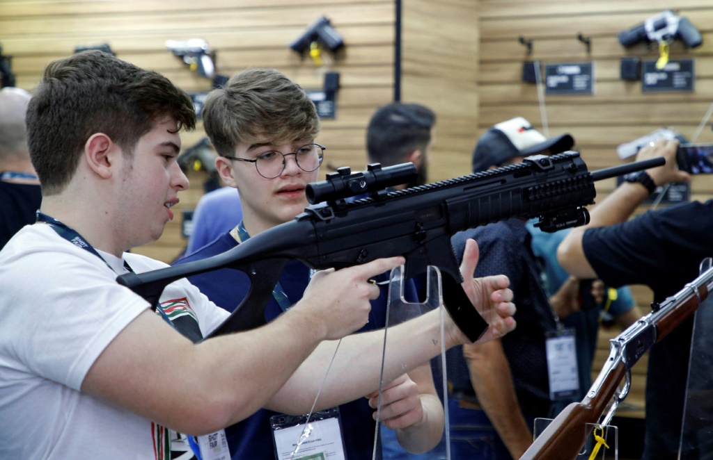 Gun enthusiasts at the Shot Fair Brazil in Joinville, in Santa Catarina state,  Brazil, in August 2022