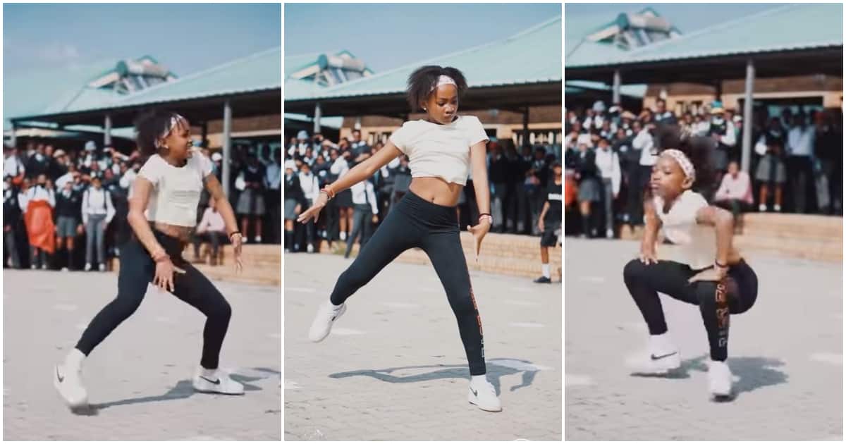 Young girl dances hard with legs apart in front of students, wows many in video