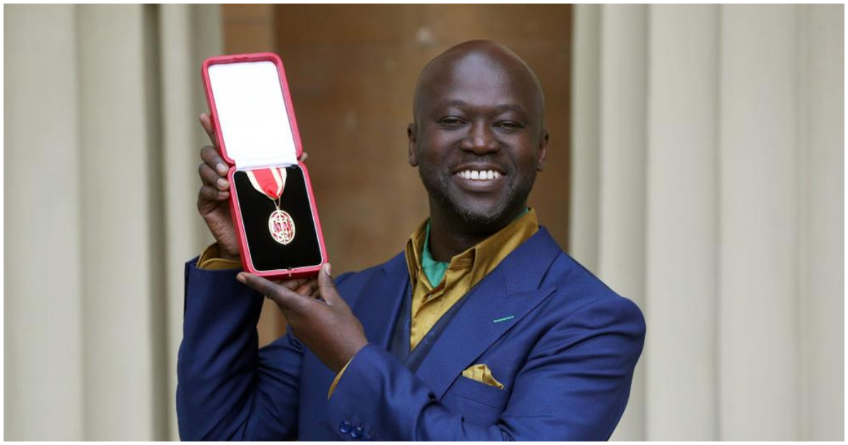 David Adjaye shows off the medal received after being Knighted