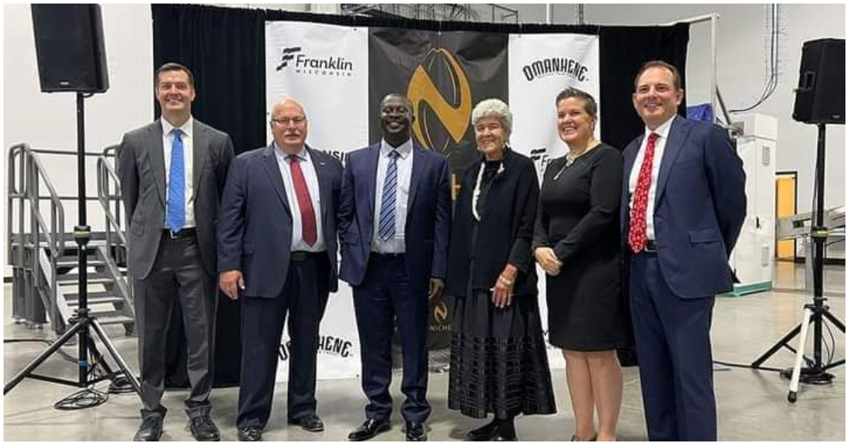 Founder of Niche Cocoa, Edmund Poku, poses with American business counterparts