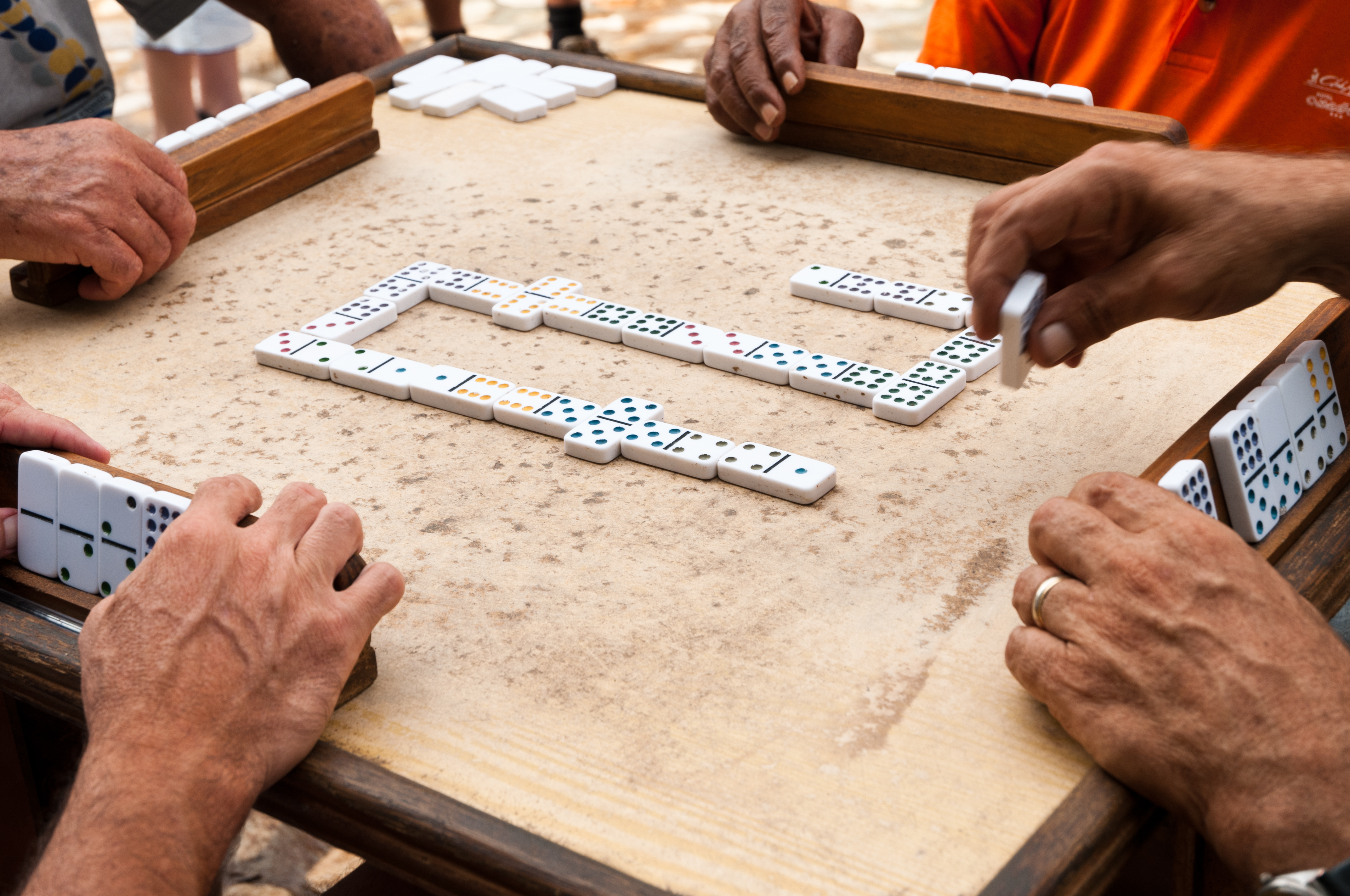 Cuban citizens are playing the dominoes game