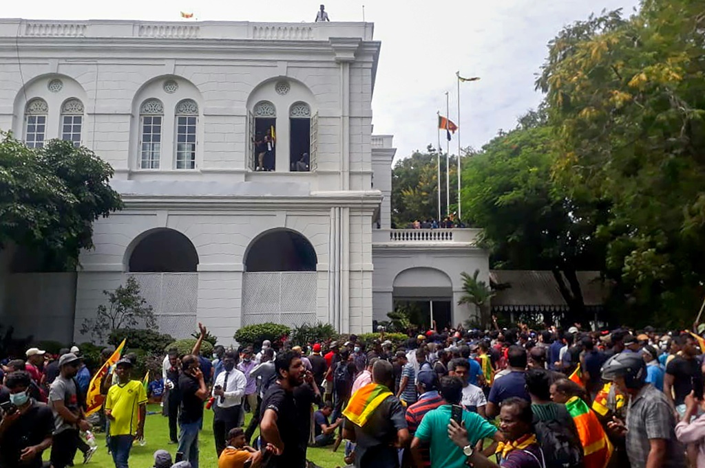 Sri Lanka's President Gotabaya Rajapaksa fled his official residence shortly before protesters stormed and overran the compound