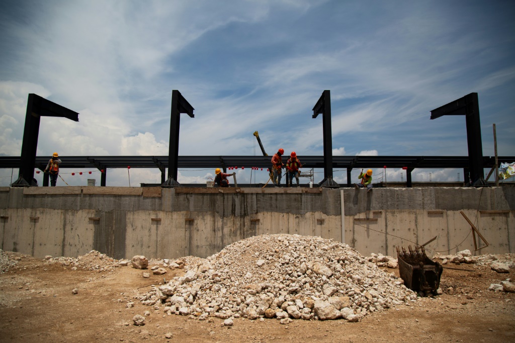 Workers building a rail stop for the Mayan Train in Uman, Yucatan, in Mexico in August 2023