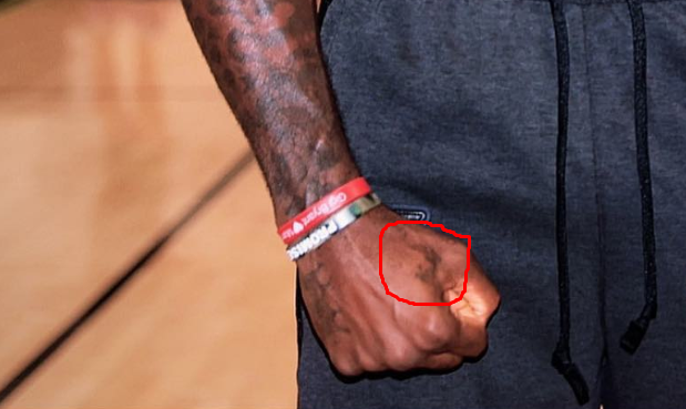 LeBron James KJ1 is tattooed on his right hand