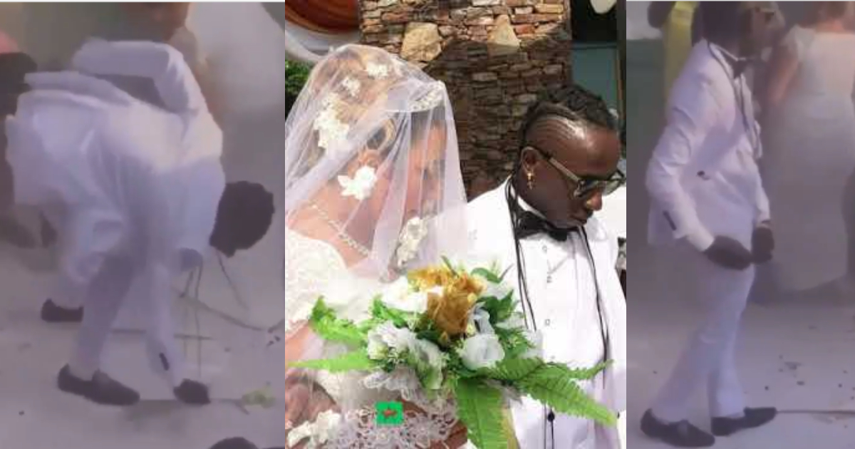 Patapaa bends to pick and pocket money sprayed on him as he dances with wife at wedding in new video