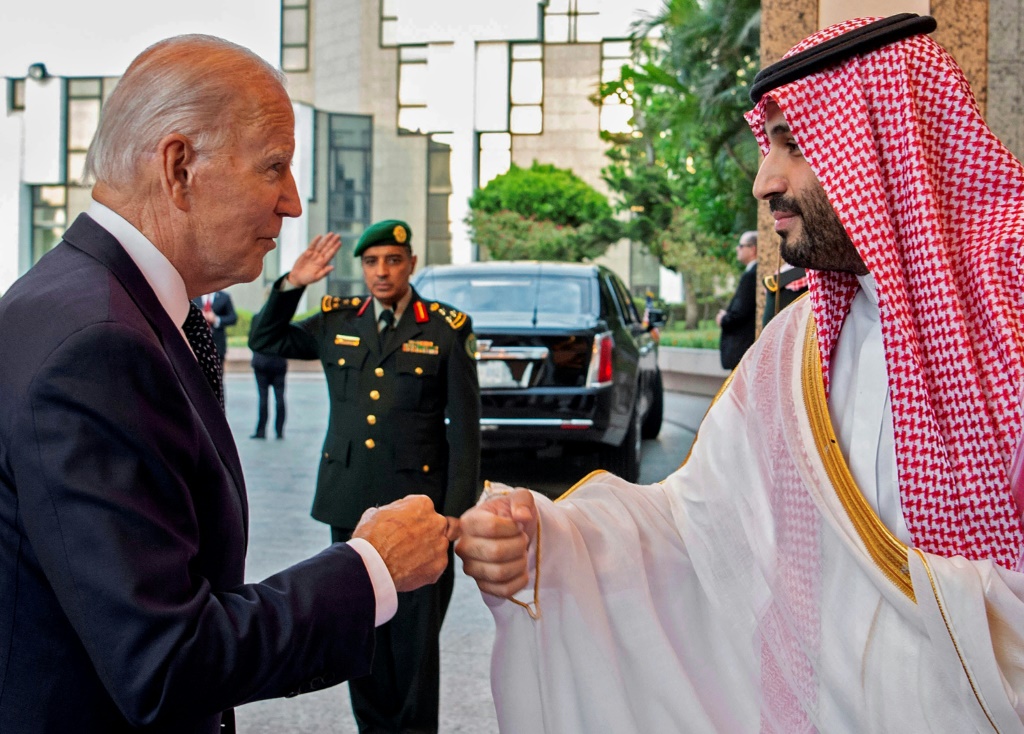Saudi Crown Prince Mohammed bin Salman bumps fists with US President Joe Biden at Al-Salam Palace in the Red Sea port of Jeddah on July 15, 2022